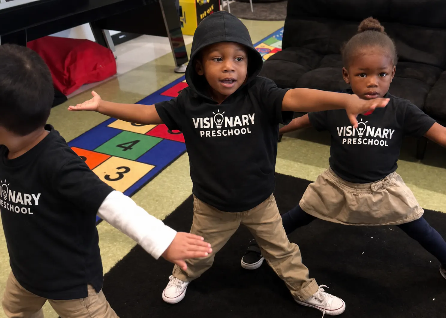Young children enjoying a guided classroom enrichment activity