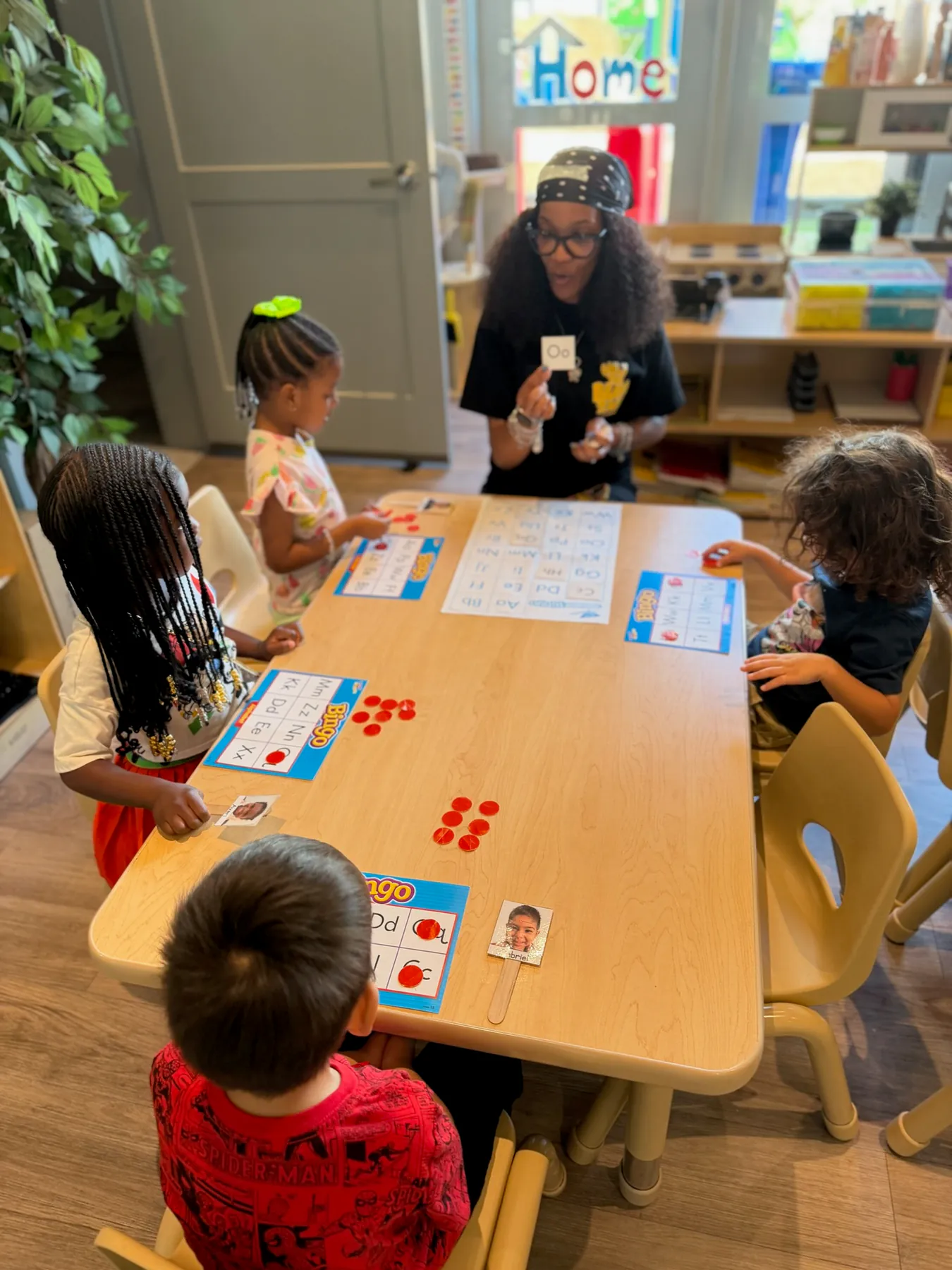 Mentored teacher leading a small-group literacy activity