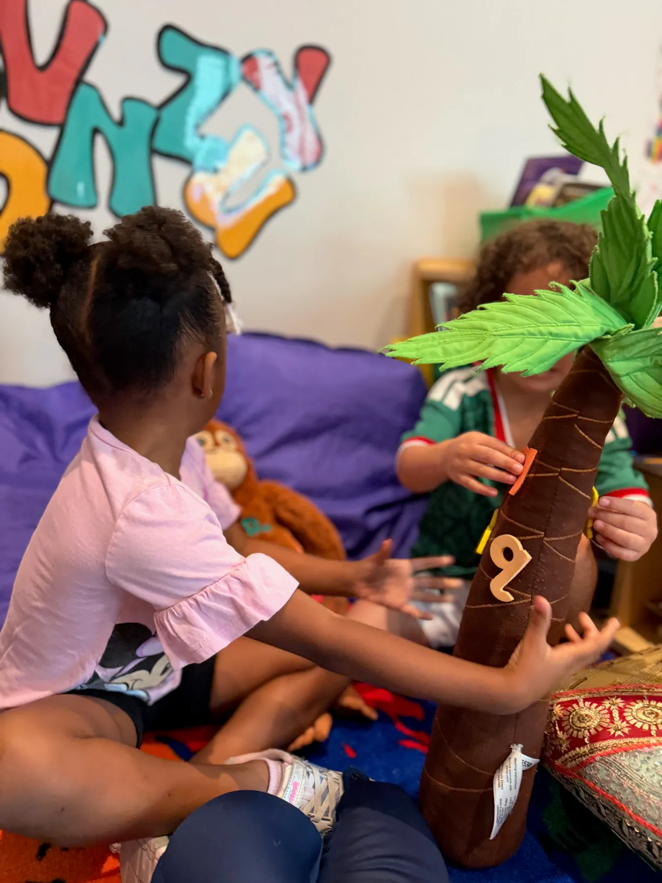 Children planning and creating together during imaginative play