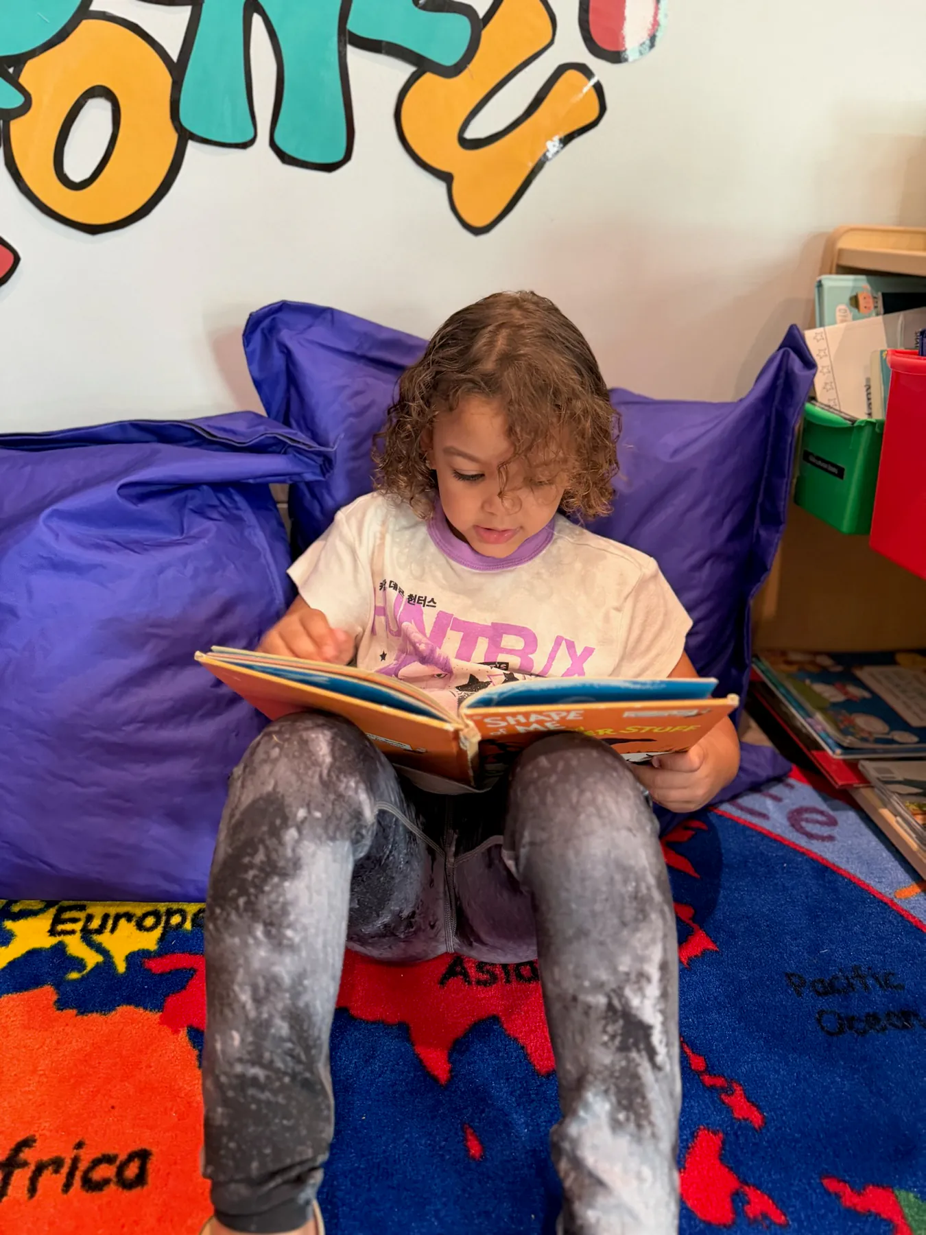 School-age child focused on writing