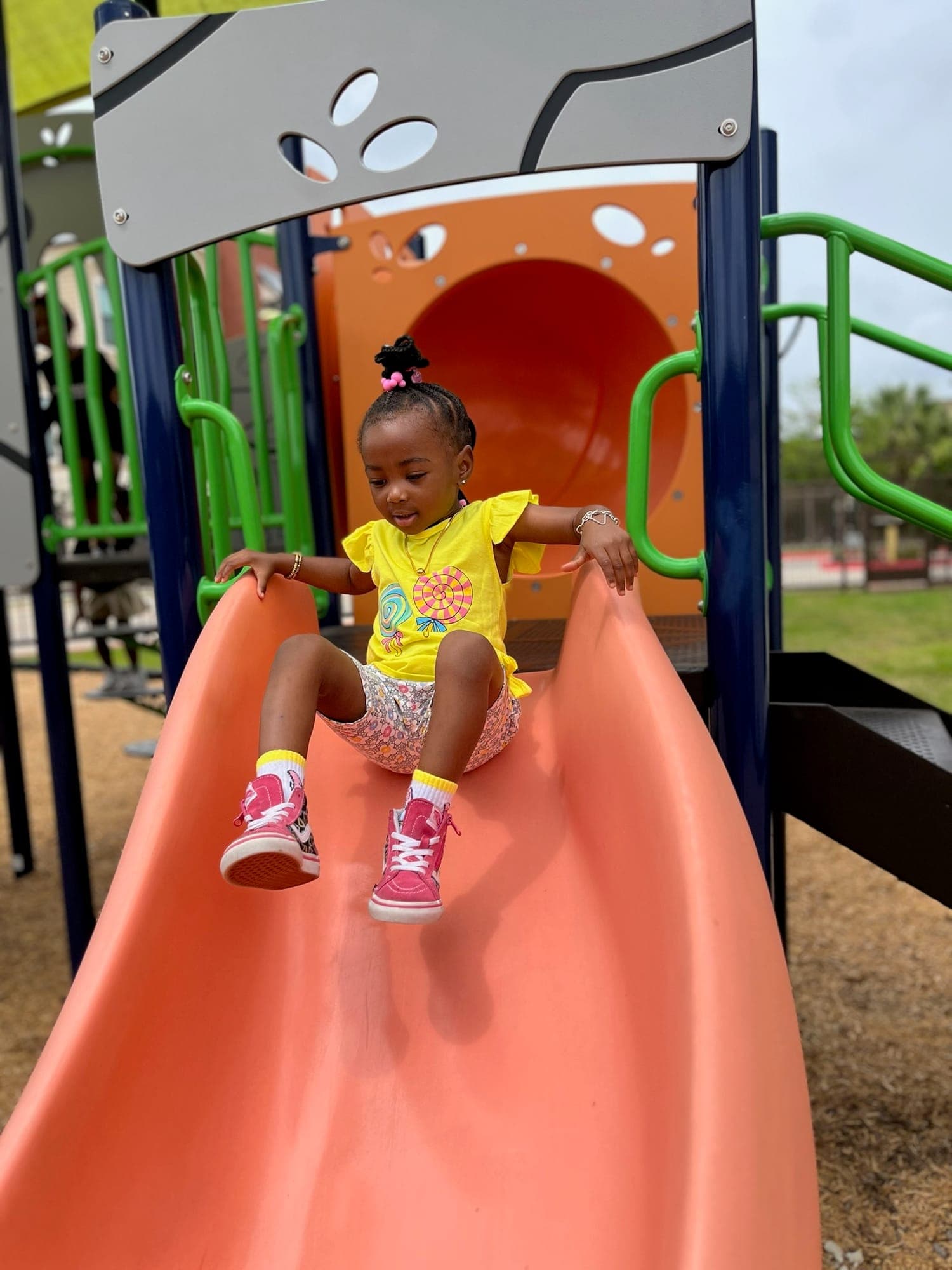 Young Sprouts child confidently exploring the playground