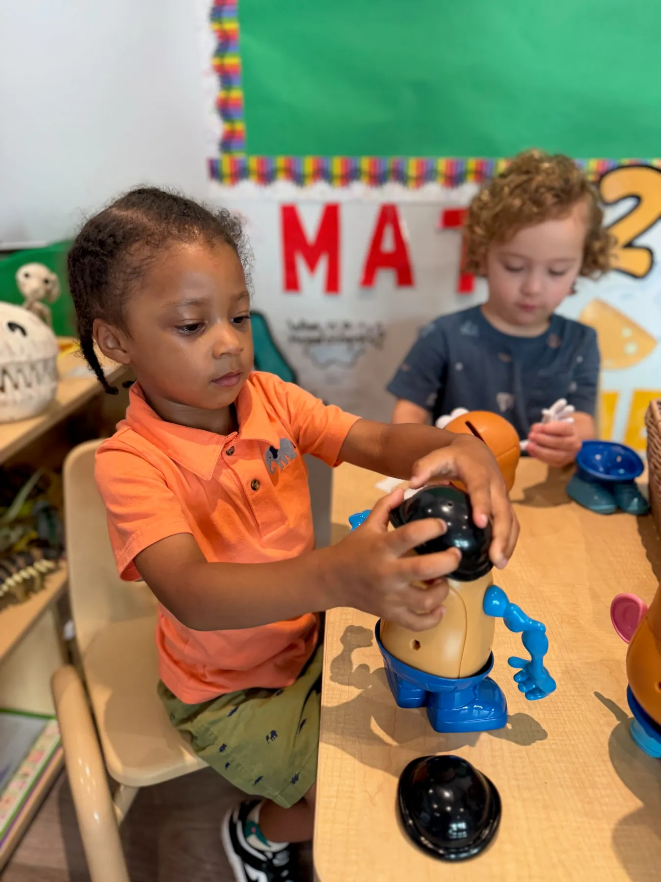 Visionaries students learning through hands-on math play