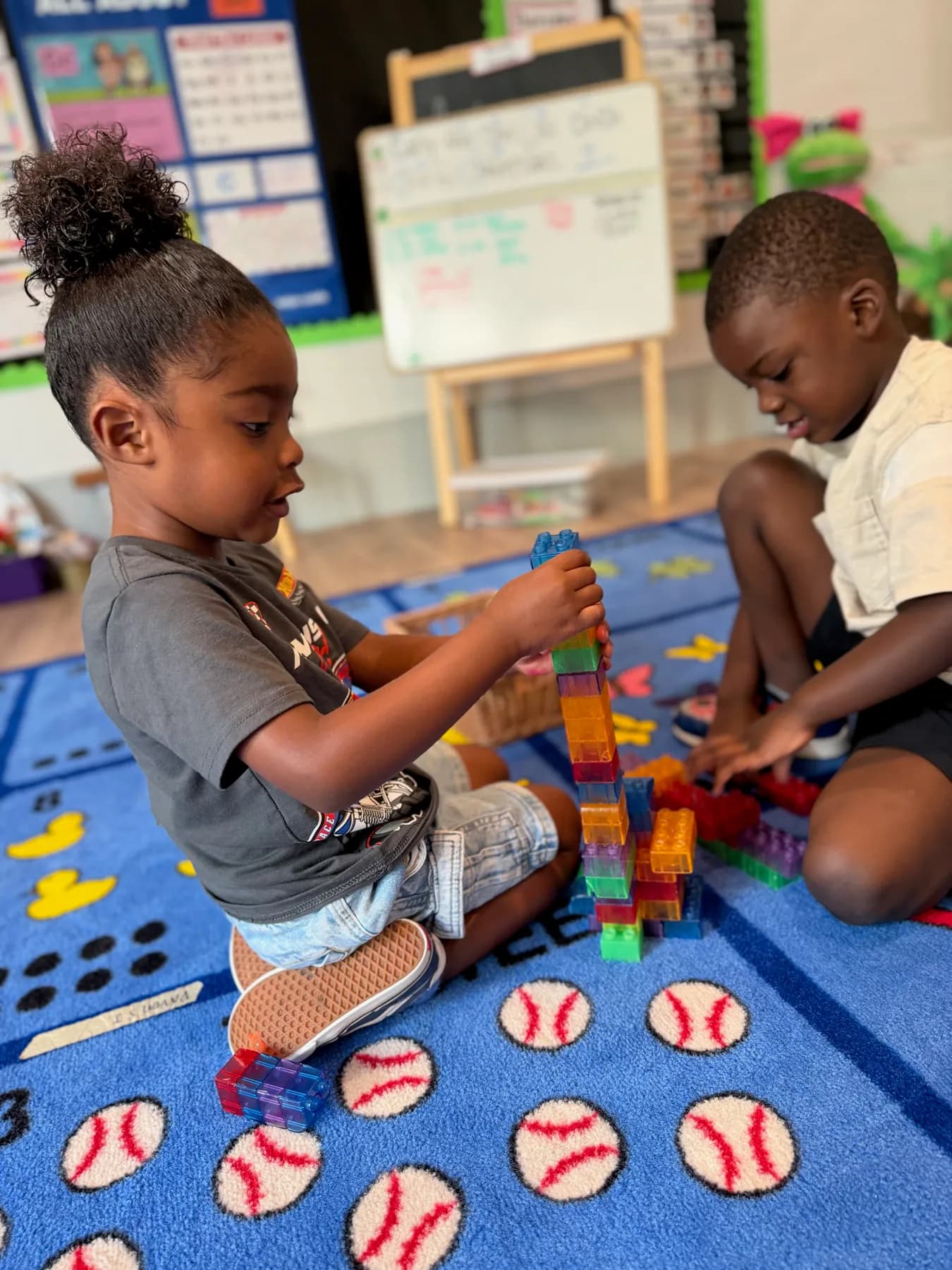 Visionaries students collaborating on a classroom construction